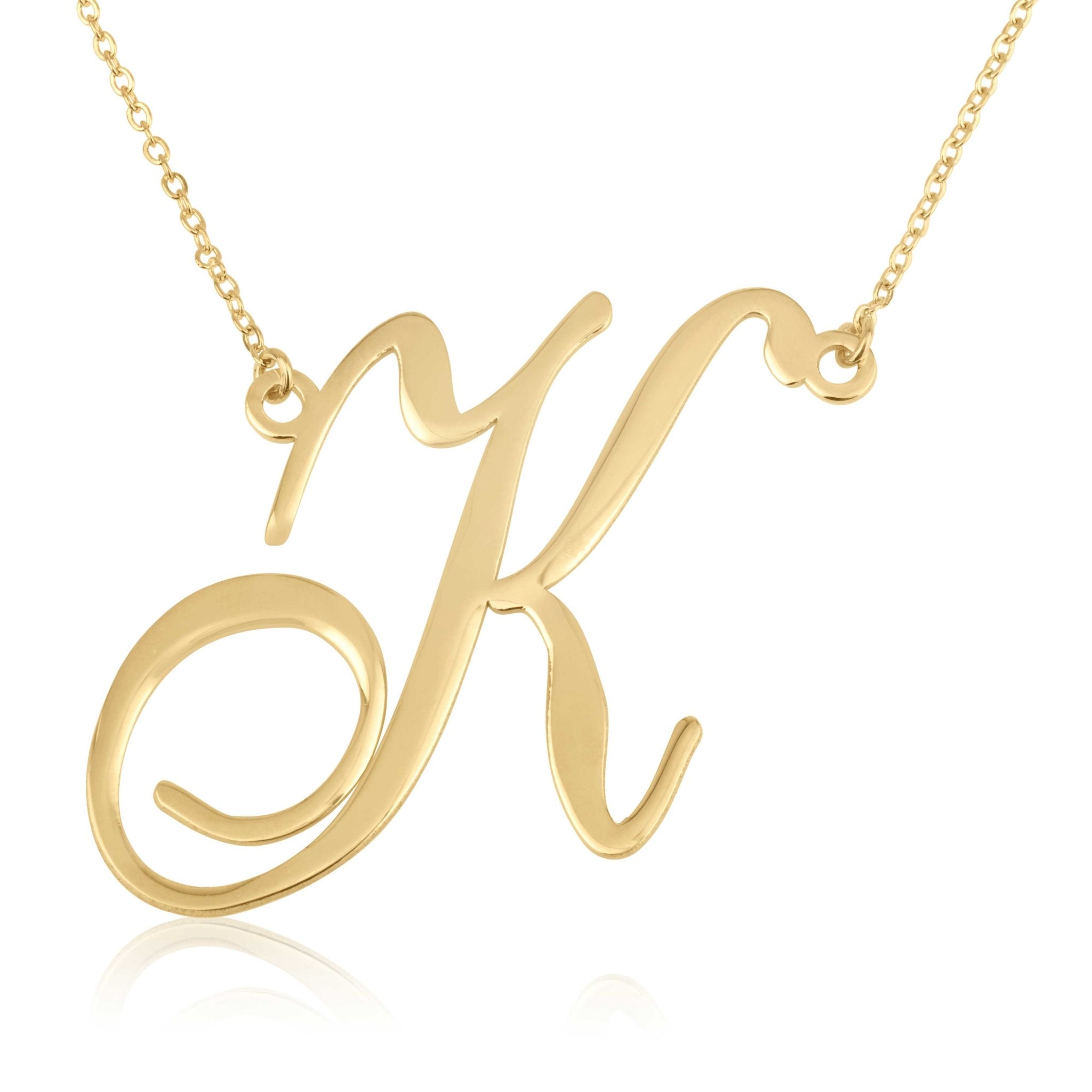 large initial necklace in cursive font